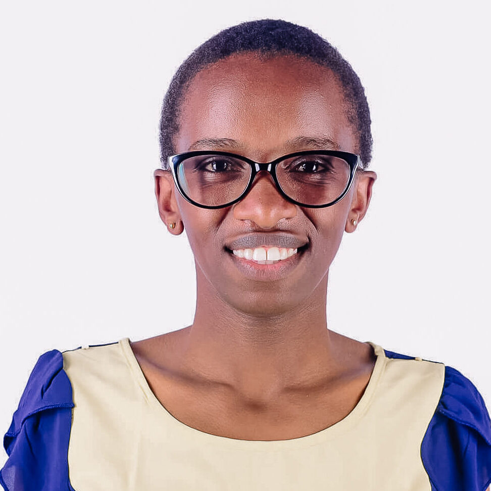 Portrait of Elizabeth Wambui, founder of Ndogo Farms, a woman-led social enterprise in Kenya transforming urban spaces into organic gardens using sustainable materials and AI-powered gardening solutions.